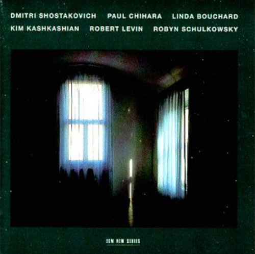 "CD cover with dark room and lit window, names and 'ECM New Series' text."