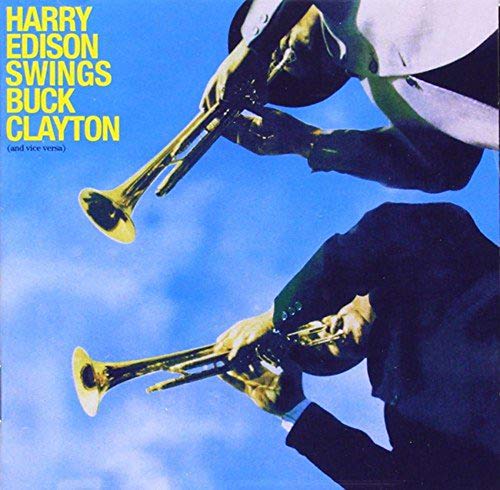 Album cover featuring two musicians playing trumpets against a blue background.