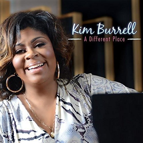 Kim Burrell album cover featuring a smiling woman with dark hair and patterned blouse.