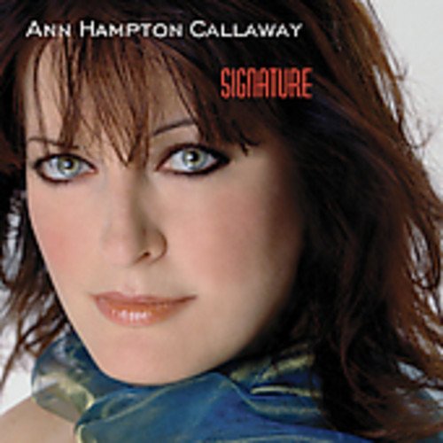 CD album cover with a woman's face and "Signature" in orange text.