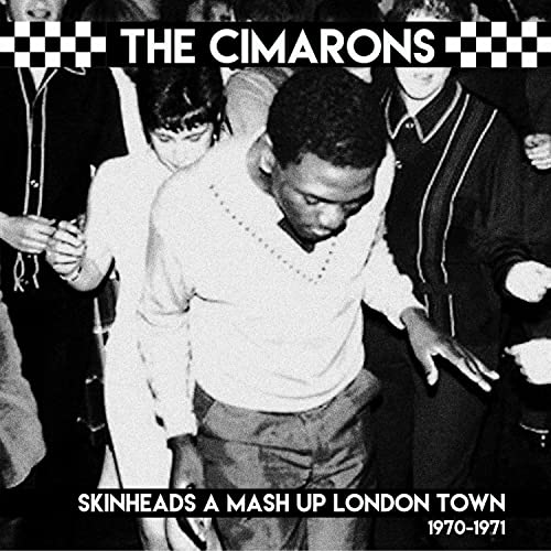Black and white album cover featuring three young men in 1970s skinhead style.