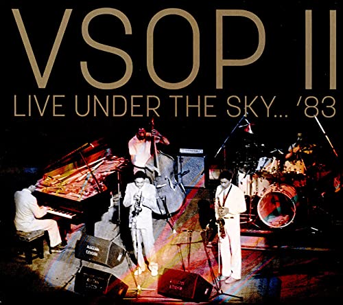 Miles Davis band performing live on stage, album cover art.