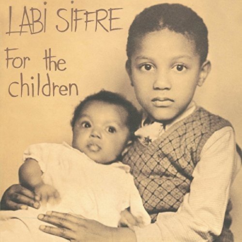 "Sepia-toned vinyl album cover featuring a boy holding a baby."