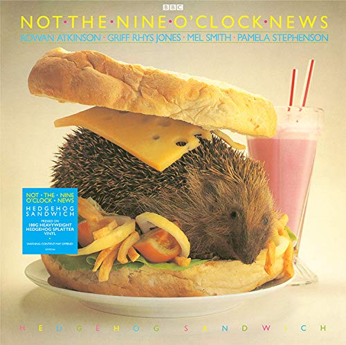 Hedgehog inside a sandwich with chips and a pink drink.