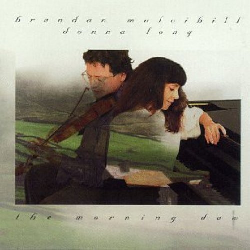 Album cover featuring a man and woman sitting together outdoors with musical instruments.