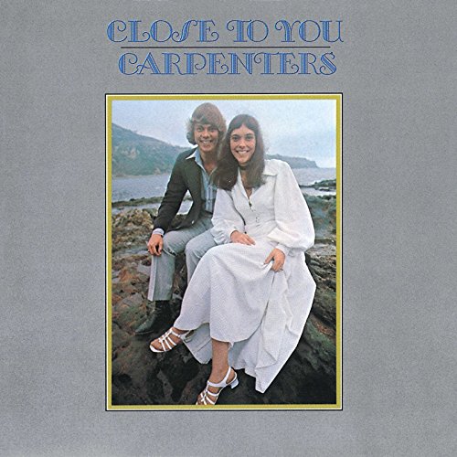 Carpenters album cover: Richard and Karen Carpenter seated by the sea.
