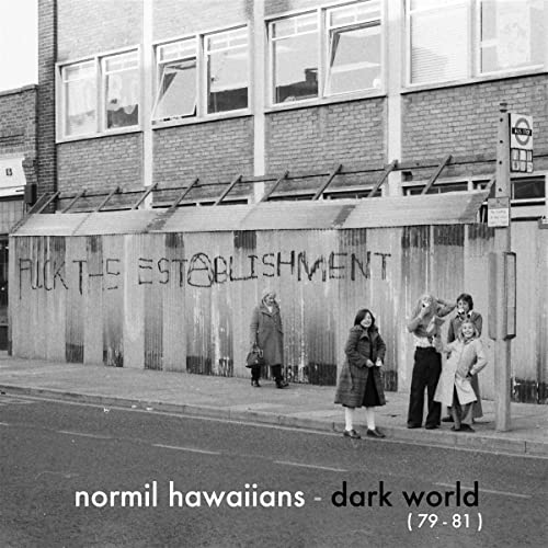 Black and white album cover with graffiti and people standing on a street.