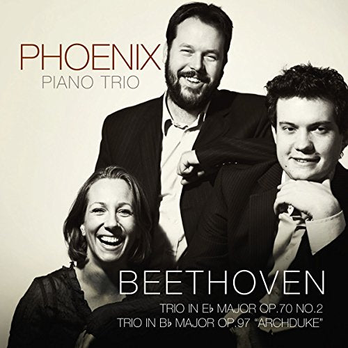 "CD cover featuring three musicians in black and white, smiling, with text overlay."