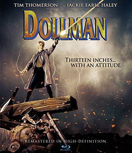 Blu-ray cover for "Dollman" featuring a man with a gun and debris.