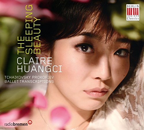 CD cover featuring a close-up of a woman surrounded by pink flowers and greenery.