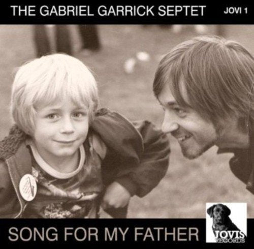 Black-and-white album cover with man and child, titled "Song for My Father".
