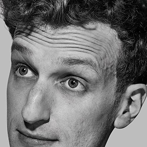 Black and white close-up portrait of Harvey Sutherland, looking forward.