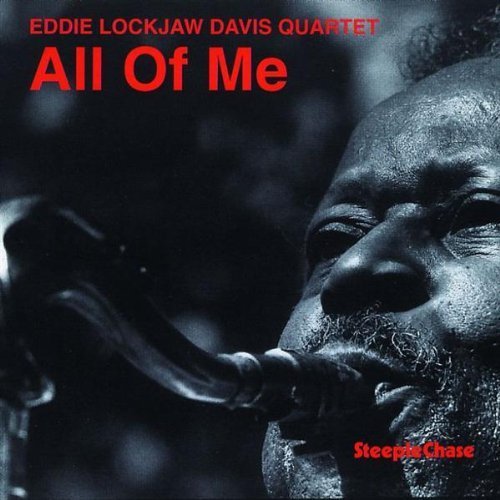 Black and white image of a man playing a saxophone, with red text overlay.