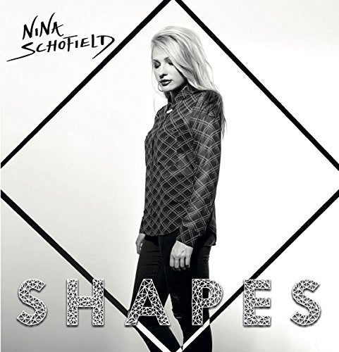 Black and white album cover with a woman in a plaid shirt and dark pants.