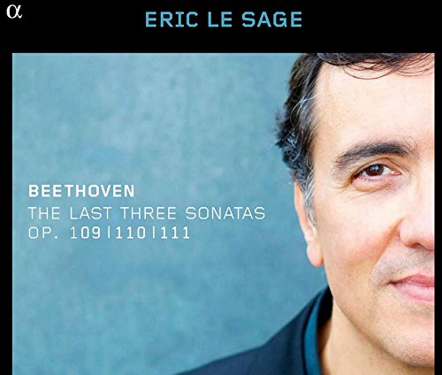 CD album cover featuring a man's face against a blue background.