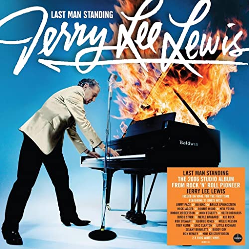 Jerry Lee Lewis portrait with a piano engulfed in flames, album cover.