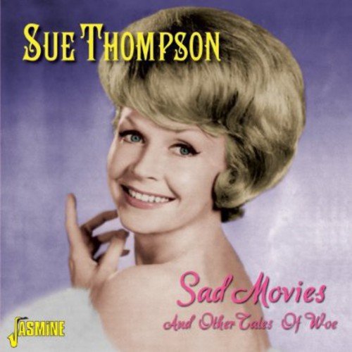 "CD album cover featuring a blonde woman against a purple background."