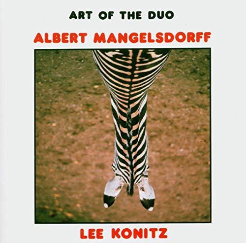 CD cover featuring a zebra’s hind legs against a green background.