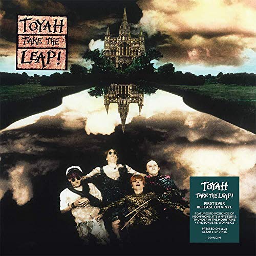Toyah album cover: band with floating cathedral over a field.