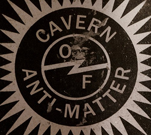 Black and white circular logo with jagged edges and text Cavern Of Anti-matter.