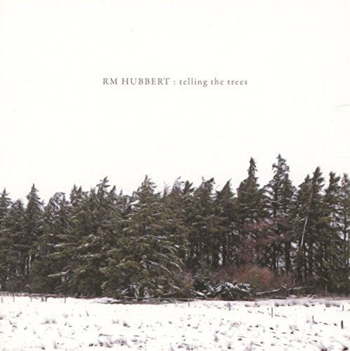 "Album cover featuring a snowy landscape with evergreen trees and the artist's name."