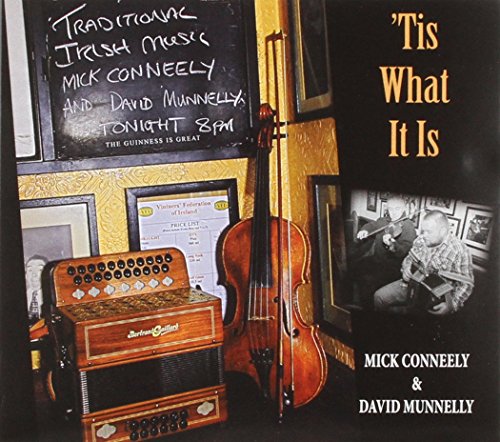"CD cover featuring accordion, cello, and blackboard with text, against a dark background."