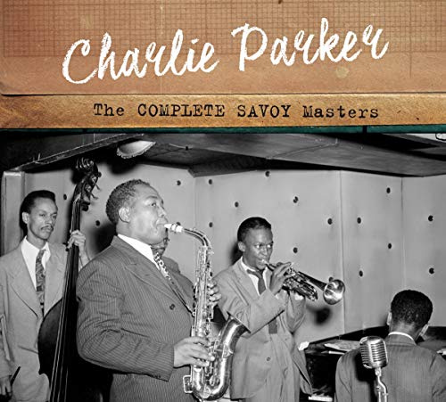 "CD cover with black-and-white photo of jazz musicians, titled 'Charlie Parker'."