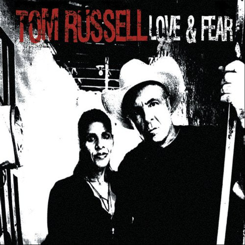 "Album cover with a man and woman, man holding a knife."