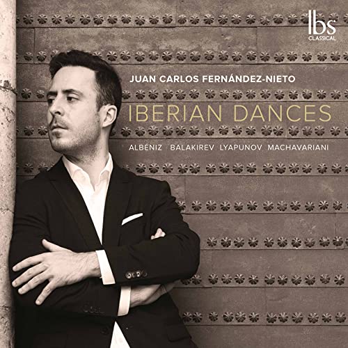 CD cover featuring pianist Juan Carlos Fernández-Nieto in a suit.