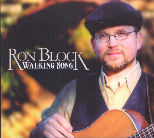 "Album cover featuring a man holding a guitar, wearing a hat and glasses."