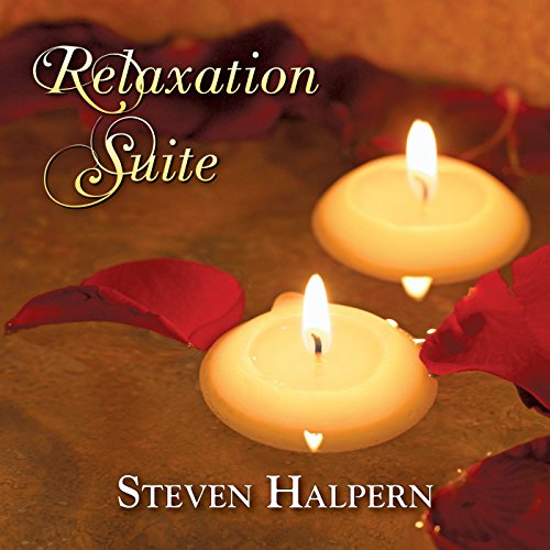 Two lit tea light candles floating in water surrounded by scattered red rose petals.