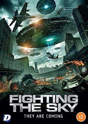 UFOs attack a city with fighter jets and burning wreckage in the foreground.