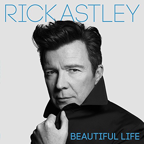 "Album cover featuring a black-and-white portrait of Rick Astley with blue text."