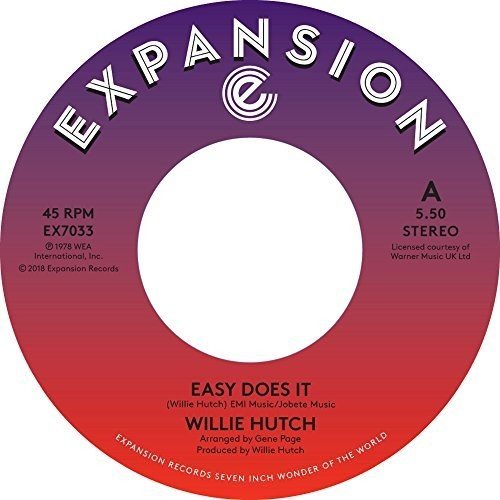 A vinyl record label with a red and purple gradient.