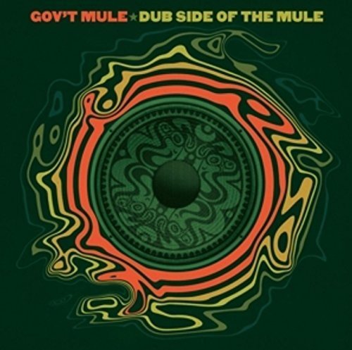 "Album cover with abstract, swirling red, yellow, and green design on dark green background."