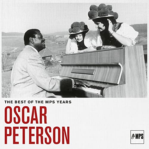Oscar Peterson album cover featuring a pianist with two women in hats.
