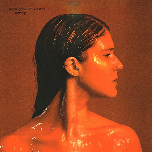 Album cover: woman’s wet hair and shoulder in warm orange tones.