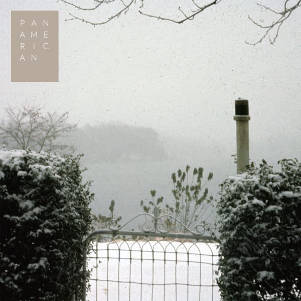 CD cover with a snowy, blurred landscape and metal gate.