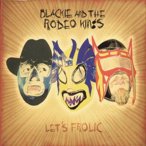 Album cover with three masked faces and orange background.