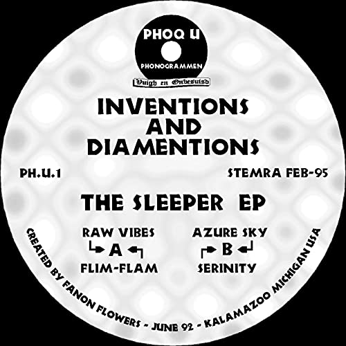 Black vinyl record label with white text: "The Sleeper EP" and tracklist.