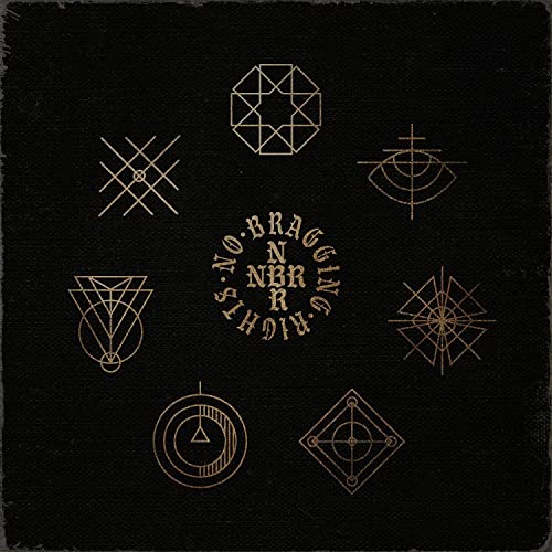Black vinyl record cover with gold geometric symbols and text.