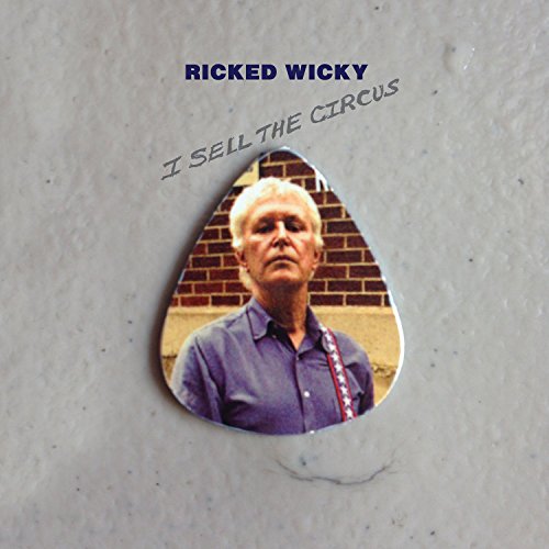 CD cover with portrait of a man and guitar pick shape.