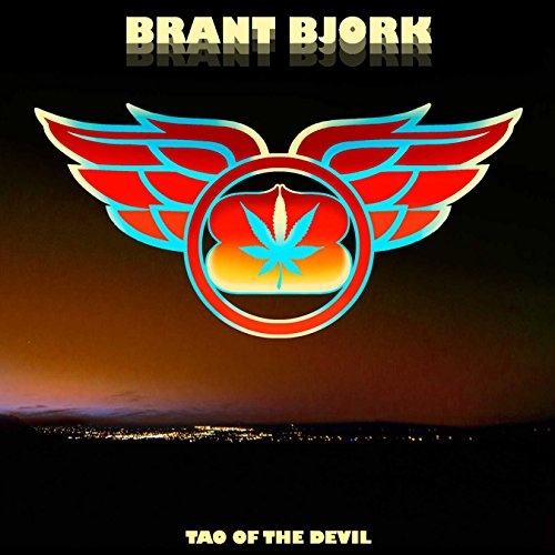 "Album cover with red wings and cannabis leaf, cityscape at dusk, 'Brant Bjork' and 'Tao of the Devil'."