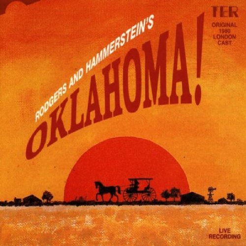 Oklahoma!" CD cover with orange sunset, horse-drawn carriage, and bold title text.