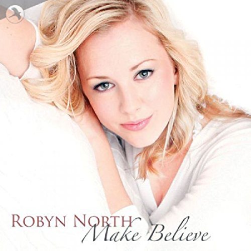"Album cover featuring a blonde woman in white, with 'Robyn North Make Believe' text."