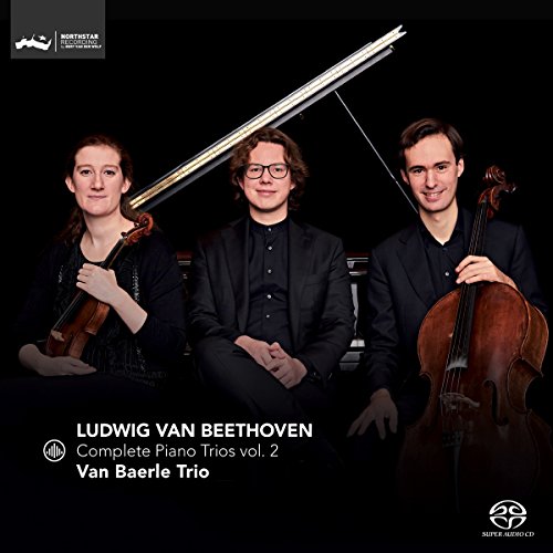 "CD cover with three musicians holding instruments against a black background."