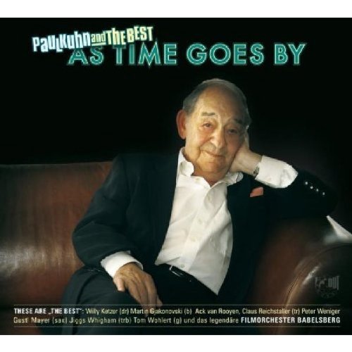 CD cover featuring portrait of Paul Kuhn, a man in a suit on a couch.