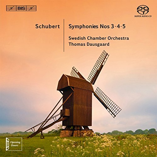 "CD cover featuring a windmill in a field with text about Schubert symphonies."