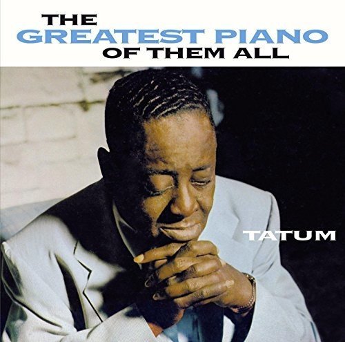 "CD cover with a man in a suit, titled 'The Greatest Piano of Them All'."