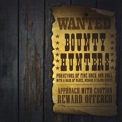 Worn “WANTED” poster for band “Bounty Hunters” against a wood background.